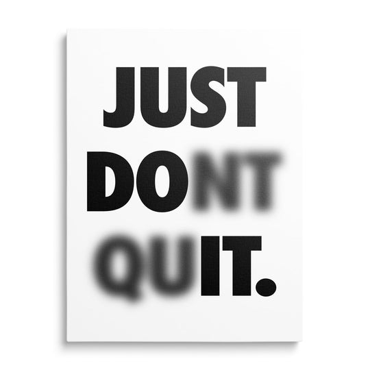 Modern motivational canvas print with a black and white quote in a clean minimalist design, front view