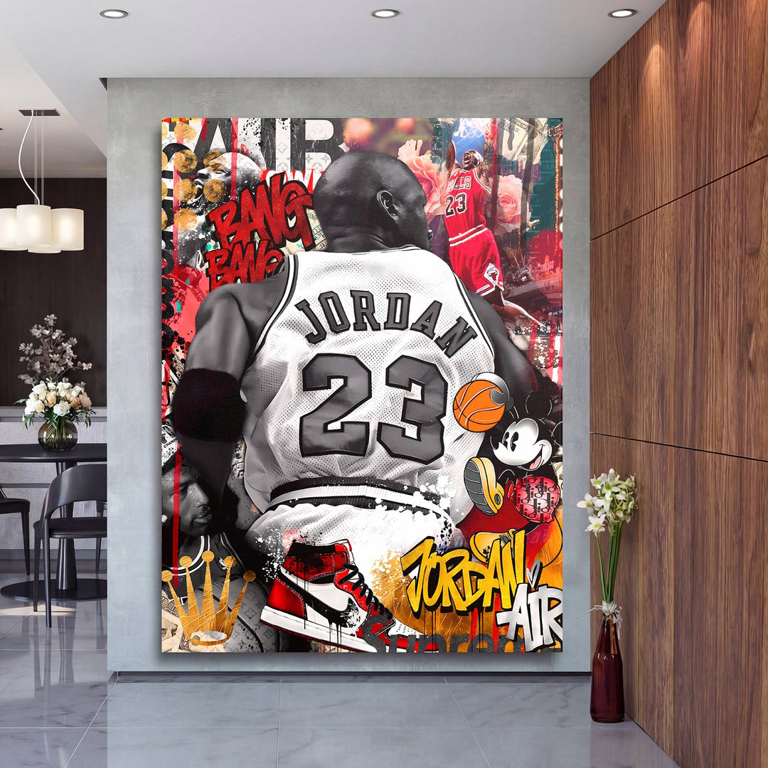 Motivational pop art wall art with a #23 basketball player, sneakers and Mickey Mouse in a modern living room.
