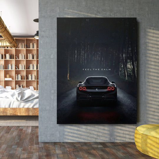 Motivational wall art with black sports car on forest road and text Feel the Calm industrial interior