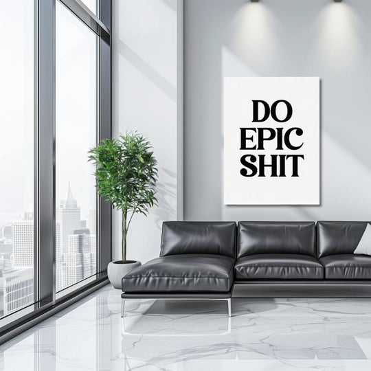 “DO EPIC SHIT” motivational poster as modern black-and-white wall art above a black leather sofa.