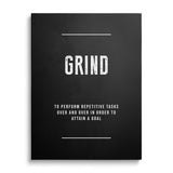 GRIND motivational canvas print on a white wall.