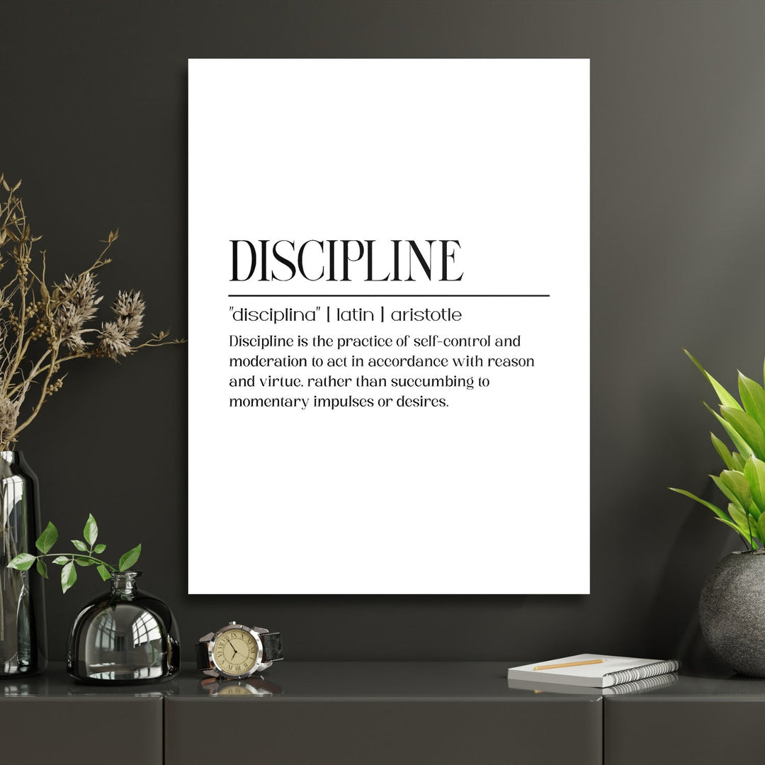 Discipline motivational canvas wall art on a dark wall above a work desk in a modern study