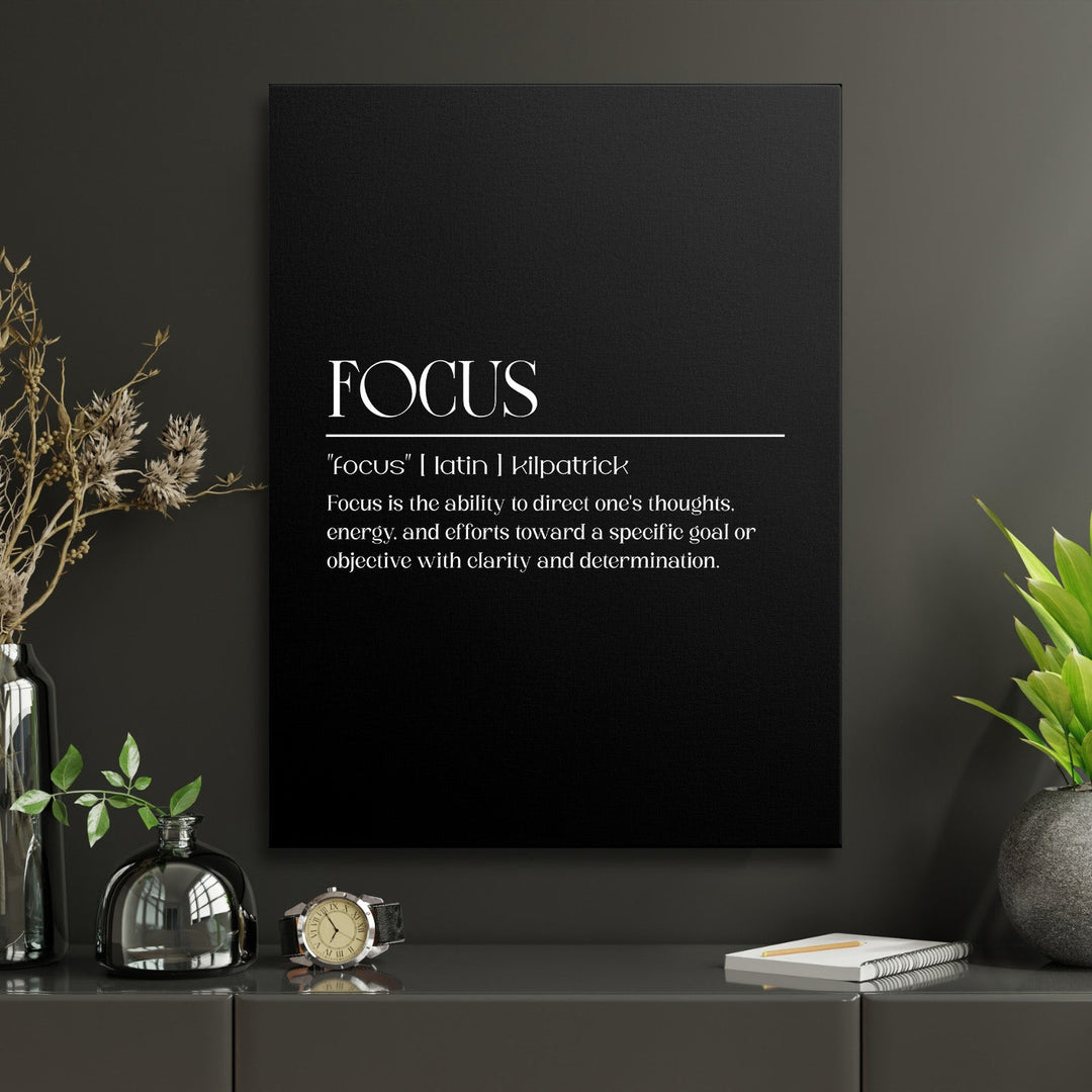 Black and white FOCUS motivational canvas wall art in a modern office