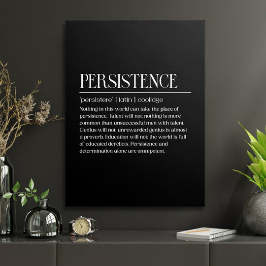 Motivational canvas print with a Persistence quote in black and white in a minimalist modern study