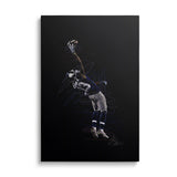 Motivational canvas wall art with a jumping soccer goalkeeper catching the ball, front view