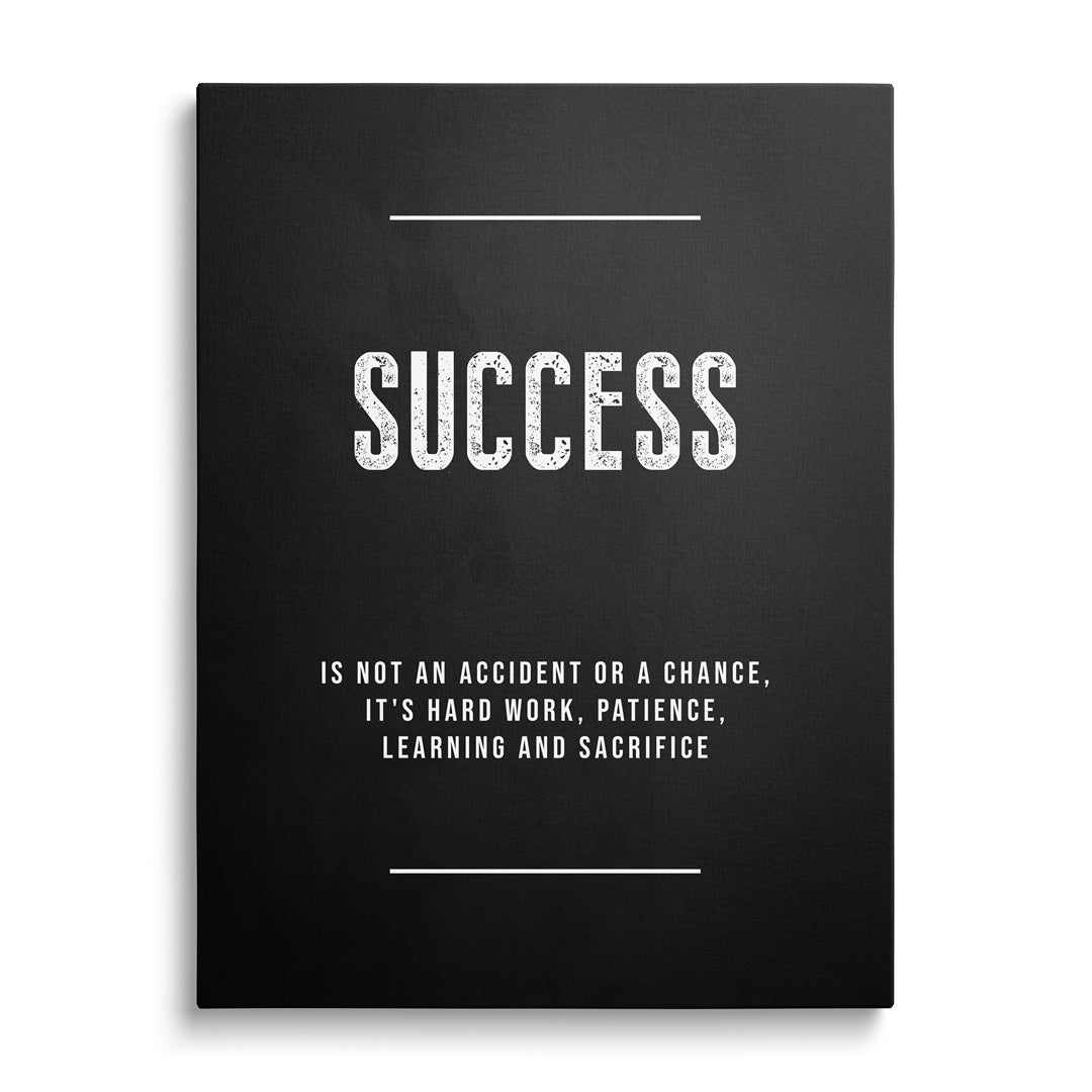 Front view of black and white motivational canvas print with a minimalist quote about success and hard work.